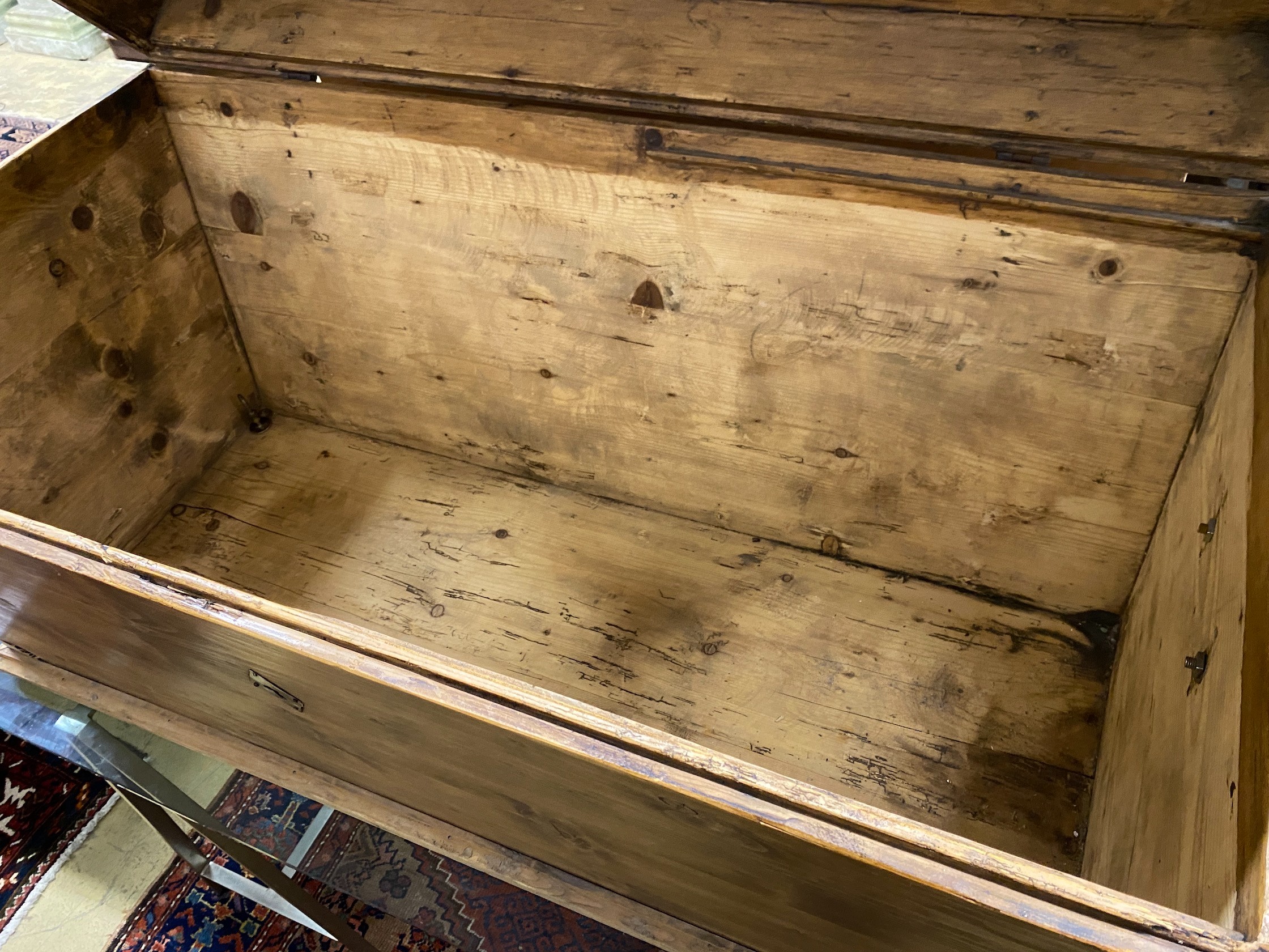 A 19th century continental pine domed top trunk, length 118cm, depth 63cm, height 70cm